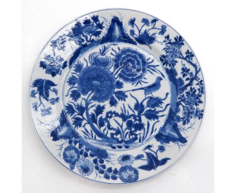 Depicting flowers and birds, 25 cm. in diameter, marked on back with double ring and censer.
