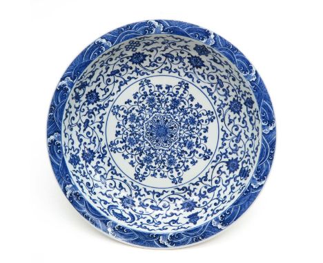 Floral decor, marked on bottom with double ring and 6 characters, 45 cm. in diameter.