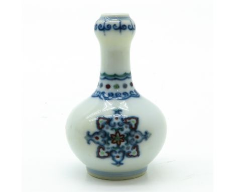 Marked on bottom with double ring and 6 characters, 10 cm. tall.