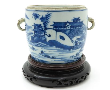 Depicting landscape scene on water with pagoda, marked on bottom with double ring, 19 cm. tall including base, without cover.