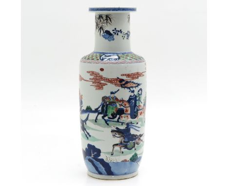 Depicting warriors on horseback, marked on bottom with double ring, small restored chip on outer rim.