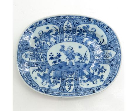 Depicting boy in garden, marked on bottom with double ring and seal mark, 25 x 20 cm., fritting.