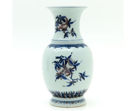 Depicting red fruit, marked on bottom with double ring, 35 cm. tall.