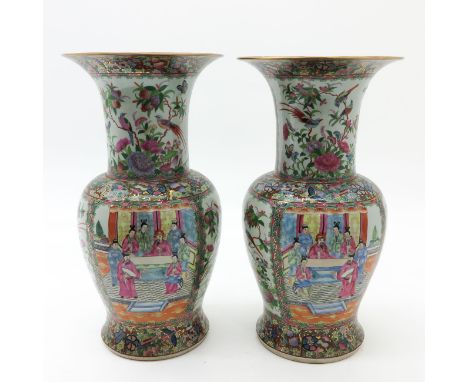 Depicting Chinese people with butterflies and flowers,marked on bottom with seal mark, 53 cm. tall.