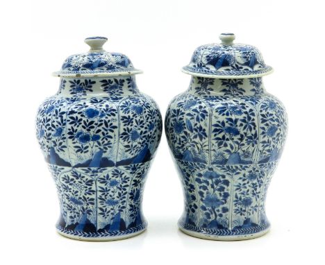 Floral decor, marked on bottom with ring and basket of flowers, 30 cm. tall, chip.