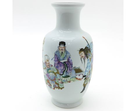 Depicting gathering of Chinese men, 35 cm. tall, marked with seal mark on the bottom.