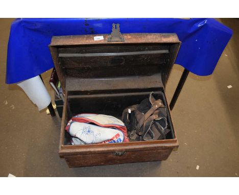 A metal trunk together with a quantity of bowls