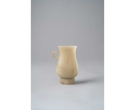 A RARE CHINESE PALE CELADON JADE ARCHAISTIC RITUAL VESSEL, ZHI SONG-MING DYNASTY  Of flattened baluster form with an everted 
