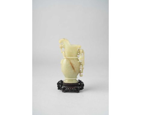 A GOOD CHINESE YELLOW JADE EWER, GONGQIANLONG 1736-95The pouring vessel of oval-section, carved in relief with archaistic scr