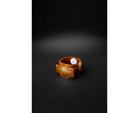 A CHINESE RUSSET-BROWN AND PALE GREEN JADE SHALLOW CYLINDER, CONGSHANG/ZHOU DYNASTYWith square corners, the sides of the holl