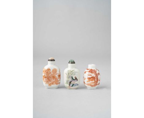 THREE CHINESE SNUFF BOTTLESLATE QING DYNASTYOne decorated with two dragons chasing flaming pearls, with a four-character Kang