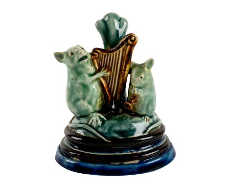 Rare, stoneware figural menu. Depicting two mice placing a harp and cornet. GT impressed monogram. Harp and Clarinet impresse