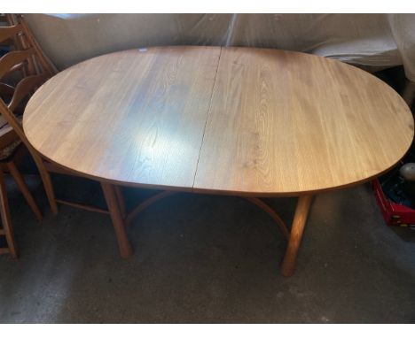 An Ercol extending dining table and six chairs.Condition ReportGood condition.