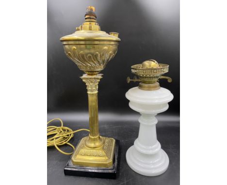 An oil lamp style electric brass table lamp with Corinthian column, slate base and switch 50cms to fitting together with a Ba