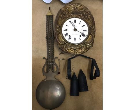 Large French Comtoise decorative brass pendulum wall clock, Moreau, a St Leger-s/.-d'Heure, enamel face, Roman numerals, cloc