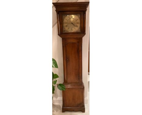 An oak longcase clock with a square brass dial inscribed E Foster, Carlisle, roman numerals and date aperture. 214cm h x 60cm