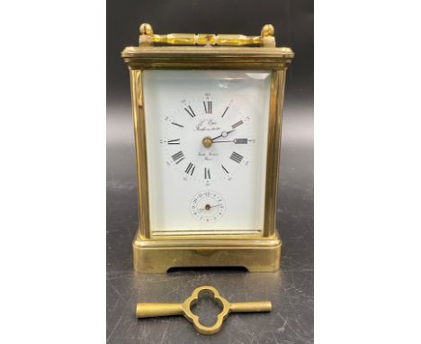 A carriage clock with repeater movement and alarm with L'Epee Saint Suzanne France to face.  Stamped Made in France 11 Eleven