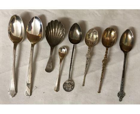 A collection of 8 silver spoons of various design and shape, and various hallmarks including caddy spoon. Weights 108gms in t