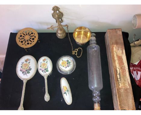 Miscellany to include brass pull door bell, dressing table set, glass rolling pin, kettle stand etc.Condition ReportAll in go