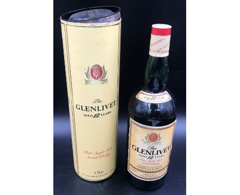 The Glenlivet Pure Single Malt Scotch Whisky aged 12 years, 1 litre, with box, sealed at cap.Condition ReportDirt grime to la