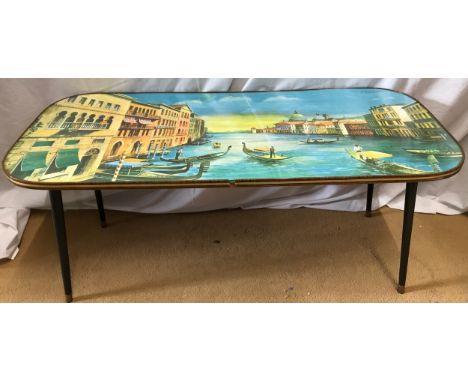 Mid century coffee table with Vannetti print to top of Venetian scene. 90cms w x 39.5 d x 40cms h.Condition ReportFairly good