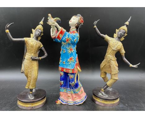 Two metal figurines together with an oriental ceramic lady with bird 30cms.Condition ReportCeramic lady lacking earring drop 