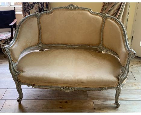 A 19thC carved gilt wood two seater upholstered sofa. 124 x 54cms.