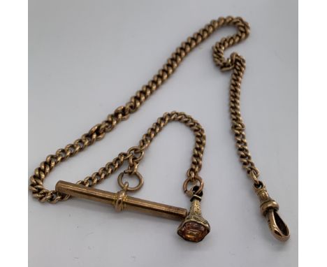 A 9ct gold watch chain, T bar and fob. Each link marked 9ct. Total weight 31.2gms. Length 38cms.Condition ReportGood conditio