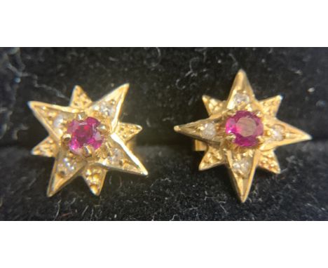 9ct gold diamond and ruby set star earrings. 1.7gms weight. From tip to tip 11mm.&nbsp;Condition ReportGood condition.