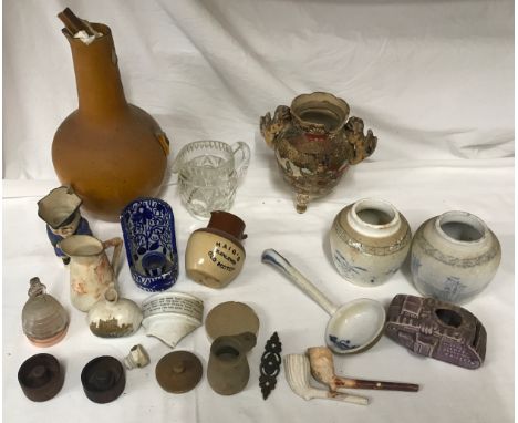 Early 20thC finds to include  a pair of Chinese ginger jars, 2 x cod bottle openers, WWI tank money box, ladle, clay pipes et
