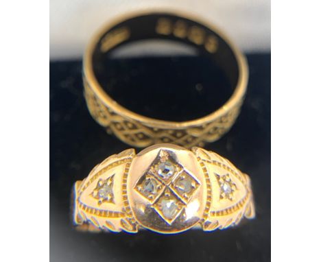 Two rings, one 18ct wedding band, the other diamond set on yellow metal, marks rubbed. Total weight 4.7gms. Size K.Condition 