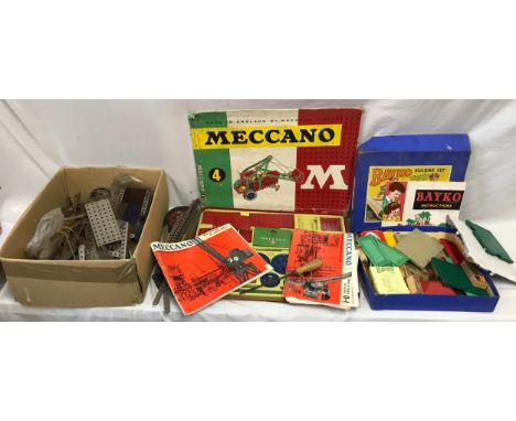 A Meccano box set No 4 with instructions together with a selection of loose Meccano and Bayko building set with box.Condition