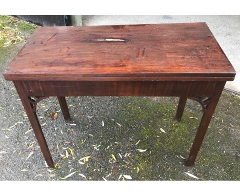 A mahogany veneered fold over card table with square legs. 91 w x 73 h x 45cms d closed.Condition ReportWorm to back stretche