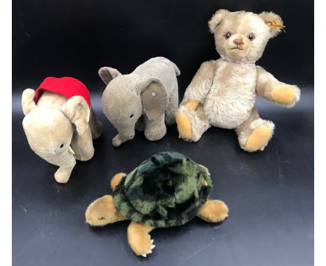 Steiff collection, teddy bear 32cms h, brown fur elephant 16cms h, grey elephant 16cms h and a tortoise, 23cms l.Condition Re