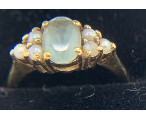 Aquamarine and seed pearl ring, size K, weight 2.2gms.Condition ReportGood condition.
