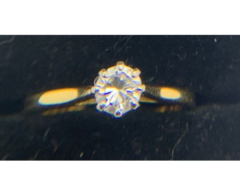A solitaire diamond ring set in 18ct yellow gold, size G/H, weight 2gms.Condition ReportGood condition.