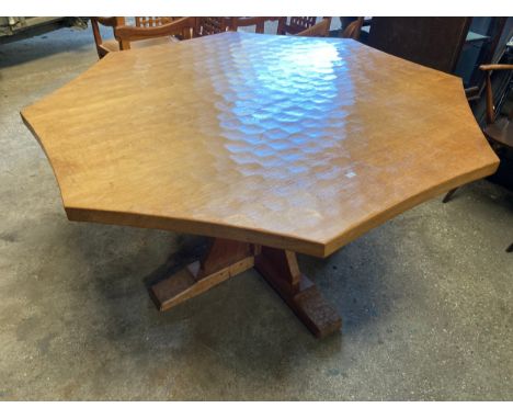 A large Robert ''Mouseman'' Thompson Oak octagonal adzed top and sides table with curved edges to top and crucifix base. 137 