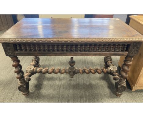 A continental oak side table with open galleried drawer. 128 x 71 x 75cms h.