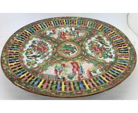 An early 19thC Cantonese fretted dish. 25 x 28cms.Condition ReportSome enamel losses and repair to rim.