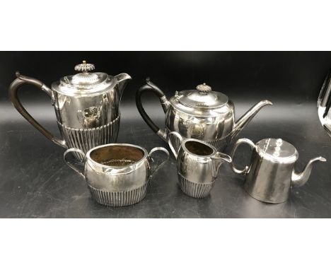 A WH &amp; S 4 piece silver plated tea service with half reeded body together with a small silver plated "tea for one" pot.Co