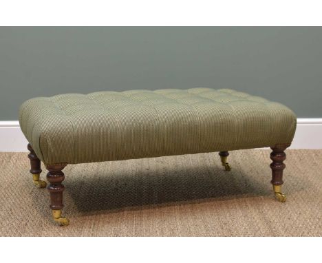 MODERN VICTORIAN-STYLE OTTOMAN FOOTSTOOL, green button upholstered stuffover seat on baluster turned legs, brass castors, 100