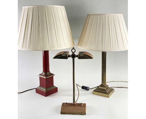 THREE BRASS TABLE LAMPS, including Corinthian column lamp, 44cms high, and a double down light, 42cms high, and another red-p