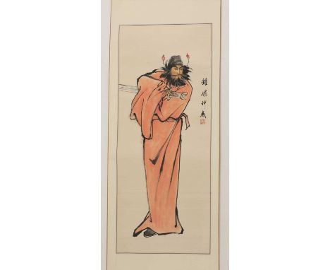 A Chinese hanging scroll,20th century, of Zhong Kui dressed in a red robe with a sword, inscribed, ink and colour on paper,84