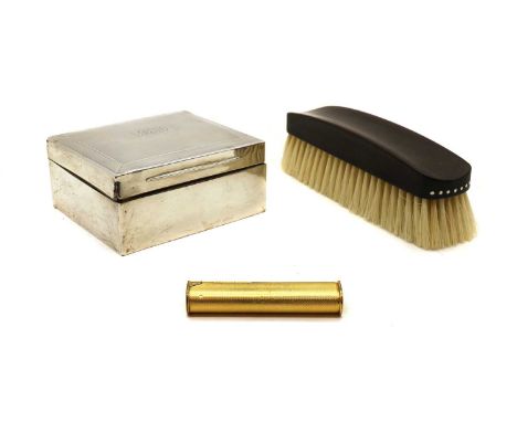 A gold-plated Dunhill lighter,with engine turned body and engraved initials to hinged top,8.5cm high,together with a Dunhill 