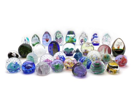 A collection of boxed Caithness glass paperweights,to include 'Communique', no. 100, 'Mystic Mountain', no. 107, 'Magic Carpe