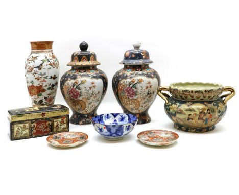 A collection of Japanese ceramics, 20th century, including a blue and white bowl, a pair of Kutani saucers, two vases and cov