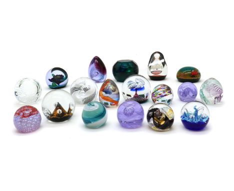 A collection of boxed Caithness glass paperweights,to include 'Towards the Millenium', limited edition 182/350, 'Tropicana', 