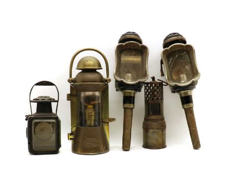 A pair of coach lamps,late 19th century, patent no 2047cm hightogether with a W Nunn brass hand lamp, with swing handle 36cm 