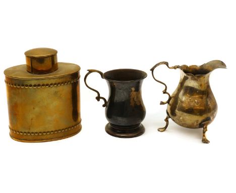 A silver christening mug, Birmingham 1903, of baluster form with scroll handle8cm hightogether with a silver cream jug, fitte