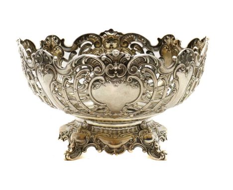 A German silver punch bowl,with crescent Moon and crown, marked 800, with pierced lattice decoration around vacant cartouches